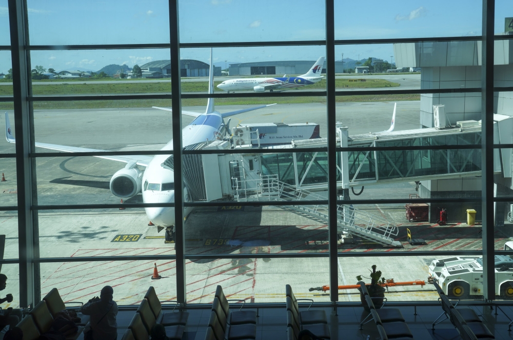 Aeroplanes are seen at the Kuching International Airport. — Picture by Chimon Upon via The Borneo Post