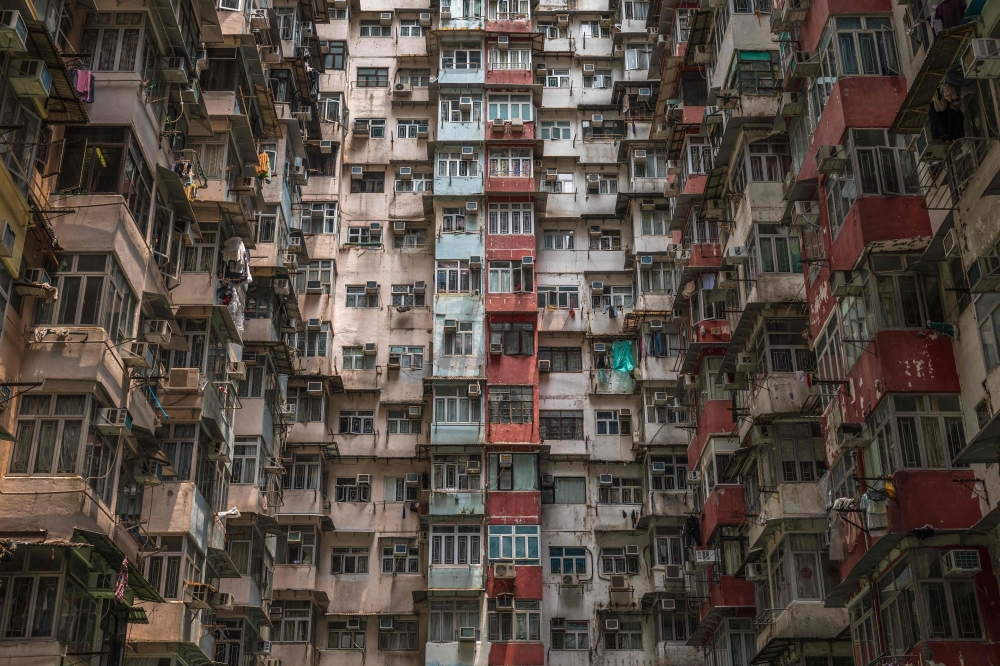 This picture taken on April 30, 2024 shows air conditioning units on an apartment building in Hong Kong. — AFP pic