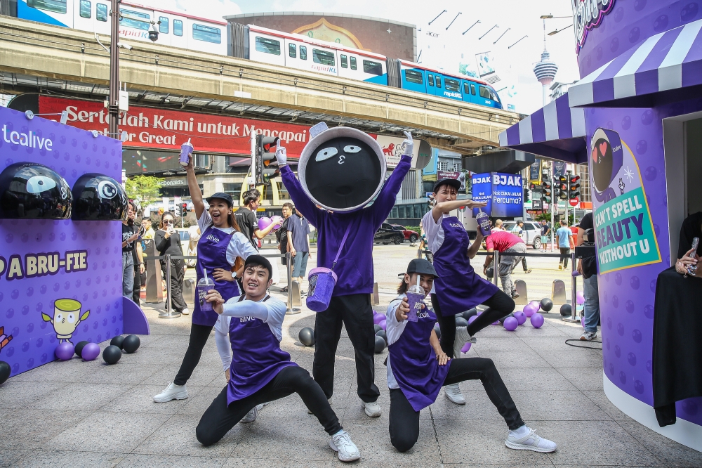 Tealive also rolled out a new mascot, Bru — a character donning a Boba in the milk tea as its head. — Picture by Yusof Mat Isa 