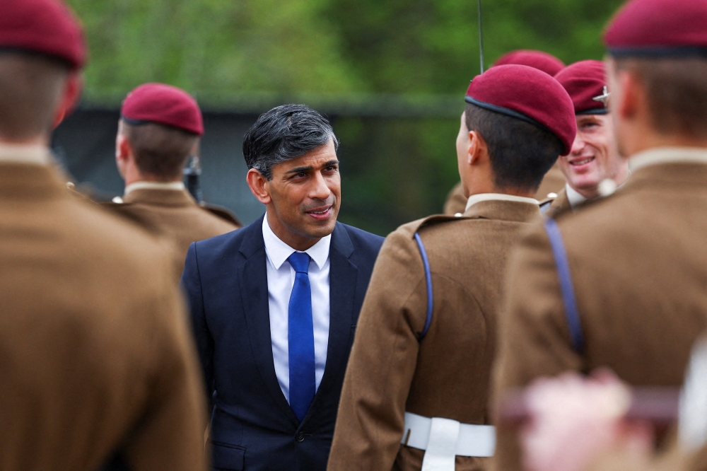 Britain’s Prime Minister Rishi Sunak looks on as he inspects the Passing Out Parade of the Parachute Regiment recruits during a visit at the Helles Barracks at the Catterick Garrison, a military base in North Yorkshire, on May 3, 2024. ― AFP pic