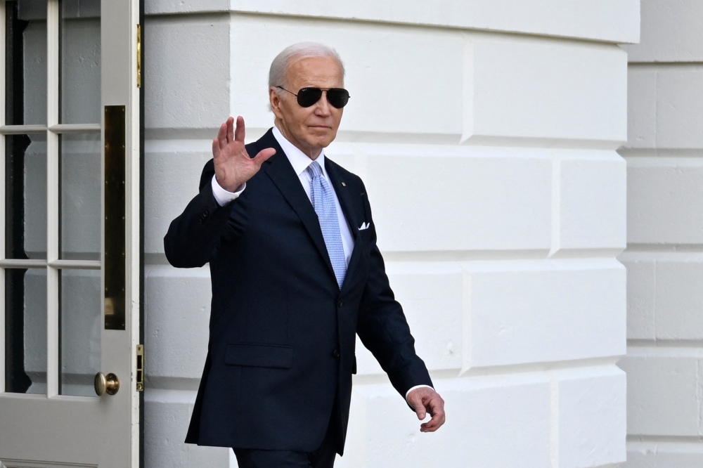 File photo of US President Joe Biden waving as he walks to board Marine One on the South Lawn of the White House on May 3, 2024, in Washington, DC. Biden is travelling to Wilmington for the weekend. ― AFP pic