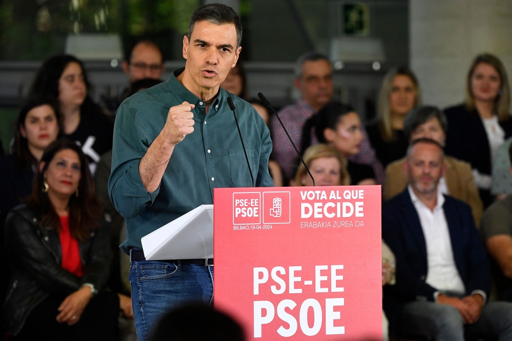 File photo of Spanish Prime Minister Pedro Sanchez gestureing as he delivers a speech during the Basque Socialist Party (PSE) closing campaign meeting in Bilbao on April 19, 2024 ahead of regional elections in the Basque Country. ― AFP pic