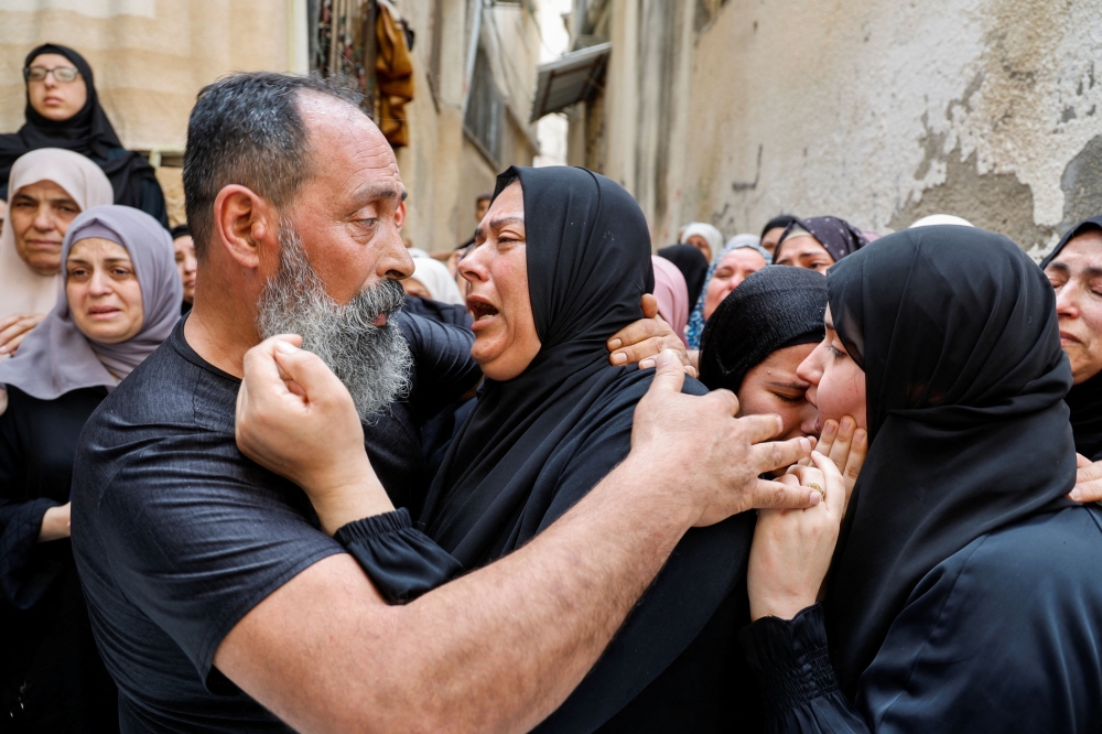 File photo of mourners reacting during the funeral of Palestinian militant, Ahmed Abu al-Foul, who was killed by Palestinian Authority forces in Tulkarm camp, in the Israeli-occupied West Bank, May 2, 2024. ― Reuters pic