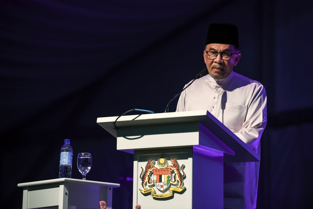 Prime Minister Datuk Seri Anwar Ibrahim delivers a speech at the Kedah-level Madani Aidilfitri celebration in Jitra May 4, 2024. — Bernama pic