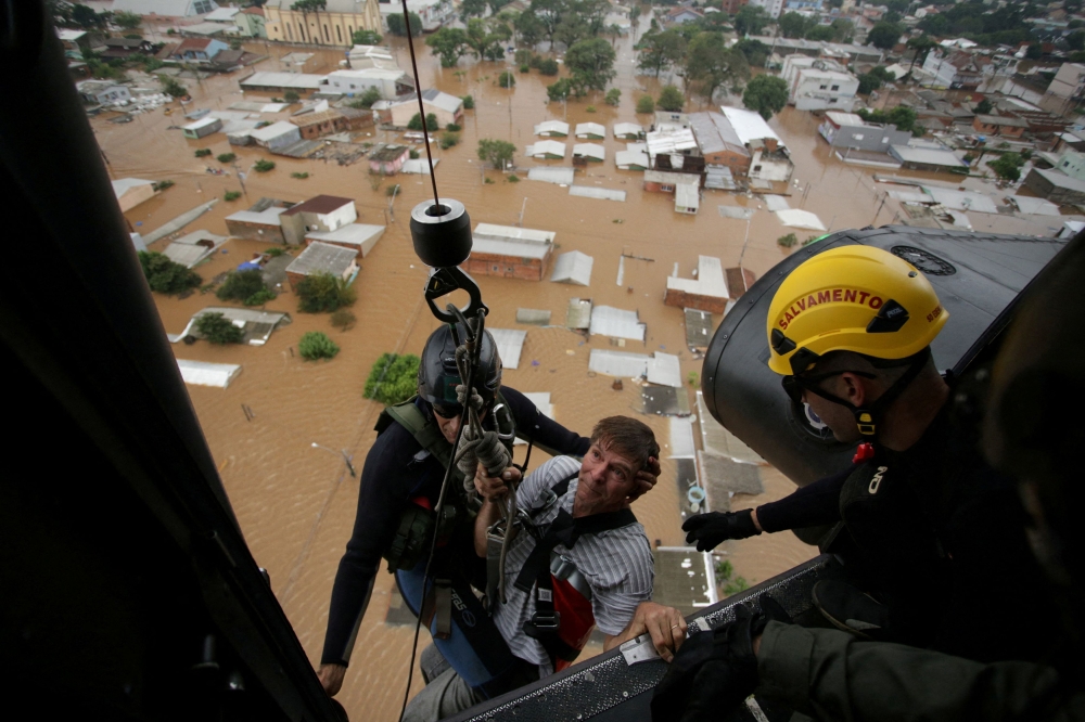 Death toll from rains in southern Brazil climbs to 66, over 100 still ...