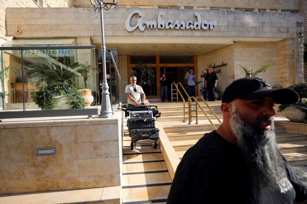 Israeli authorities raided a Jerusalem hotel room used by Al Jazeera as its office after the government decided to shut down the Qatari-owned TV station’s local operations yesterday. — Reuters pic