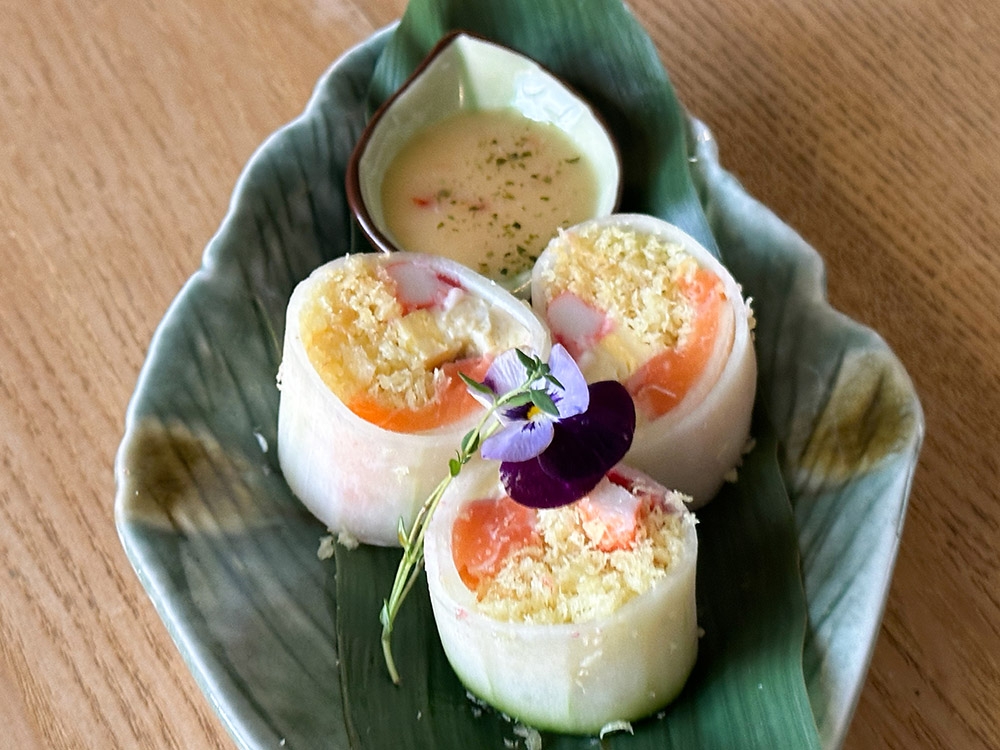 Salmon Fuyu Maki uses cucumber rather than seaweed for extra crunch and it comes with salmon, omelette and crispy fried bits to give it texture.