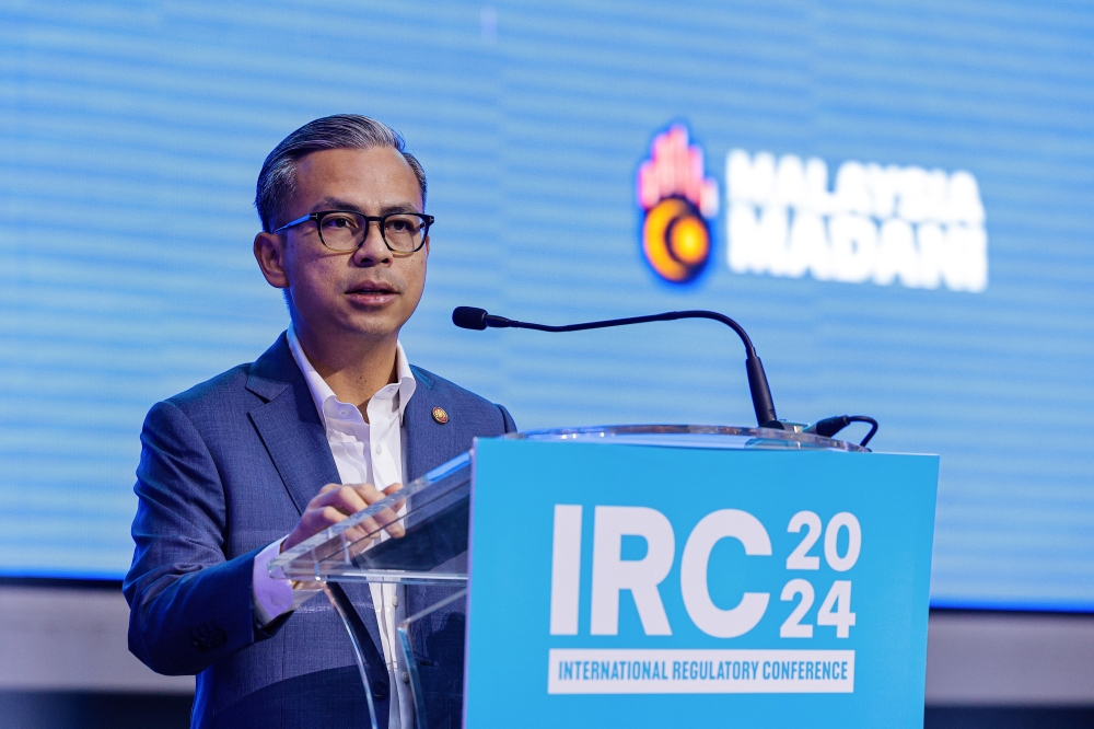 Communications Minister Fahmi Fadzil speaks at the inaugural International Regulatory Conference (IRC 2024) in Kuala Lumpur May 6, 2024. — Bernama pic