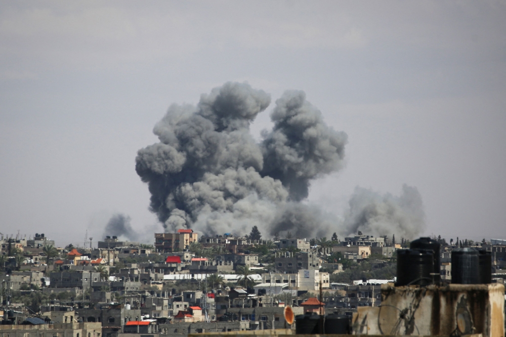 A picture taken on May 6, 2024 shows smoke billowing following bombardment east of Rafah in the southern Gaza Strip, amid the ongoing conflict between Israel and the Palestinian Hamas movement. — AFP pic