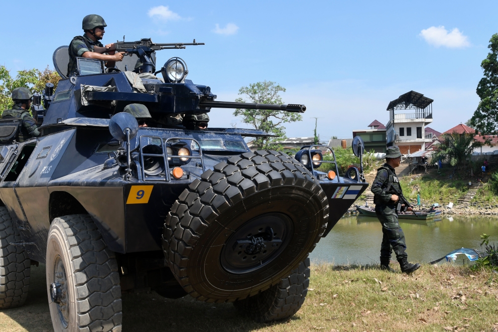 Armoured cars from the South-east Brigade of the General Operations Force’s (GOF) Shield Squadron 9 conduct patrols along Sungai Golok, May 7, 2024. — Bernama pic 