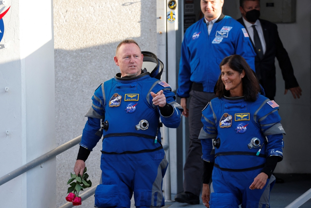 Nasa astronauts Butch Wilmore and Suni Williams walk at Nasa’s Kennedy Space Center, ahead of Boeing's Starliner-1 Crew Flight Test (CFT) mission on a United Launch Alliance Atlas V rocket to the International Space Station, in Cape Canaveral, Florida May 6, 2024. — Reuters pic  