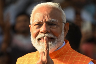 India’s Modi casts his vote as giant election reaches half-way mark