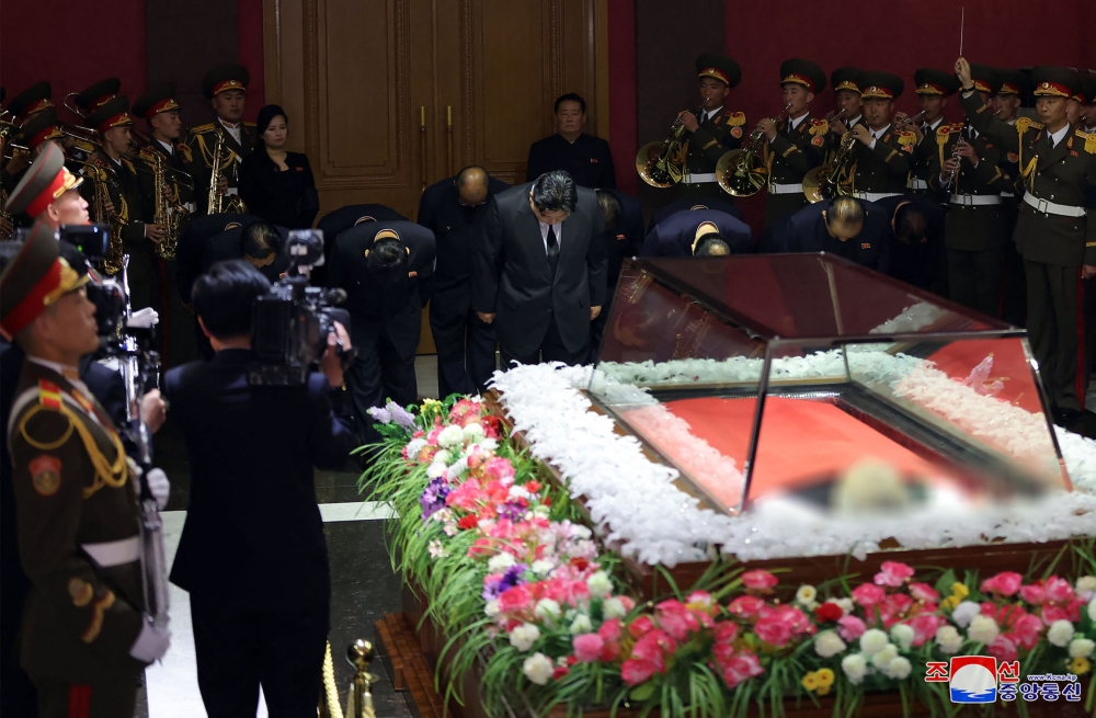 North Korea’s former propaganda chief, credited with masterminding the personality cult surrounding the ruling Kim dynasty, has died, state media said today, with leader Kim Jong-un attending his funeral. — AFP pic/KCNA via KNS