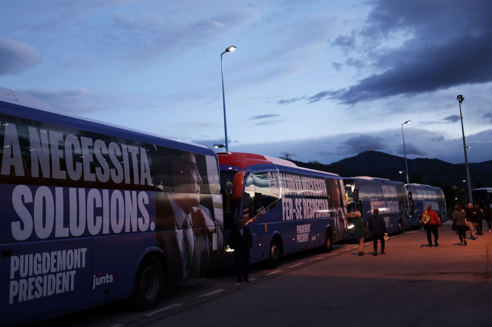 Buses which transported the supporters of exiled Catalan separatist leader Carles Puigdemont are parked during a Junts Per Catalunya (Together for Catalonia) party rally, in the French town of Argeles-sur-Mer, France, May 7, 2024. — Reuters pic