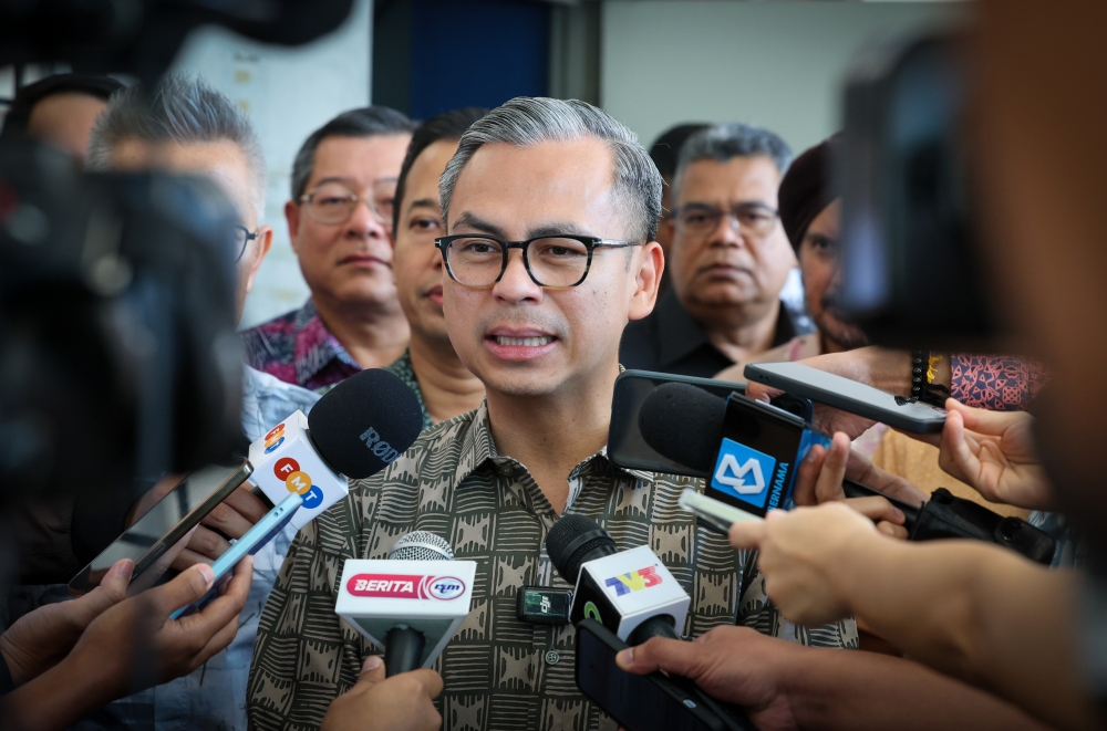 Communications Minister Fahmi Fadzil speaks to reporters after the Network and Infrastructure Partnership Framework soft launch in Hulu Selangor May 9, 2024. ― Bernama pic