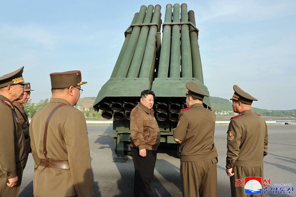 This picture taken on May 10, 2024 and released from North Korea's official Korean Central News Agency (KCNA) on May 11, 2024 shows North Korean leader Kim Jong Un inspecting the 240mm multiple rocket launcher system at an undisclosed location in North Korea. ¬— Picture by KCNA via KNS/ AFP 