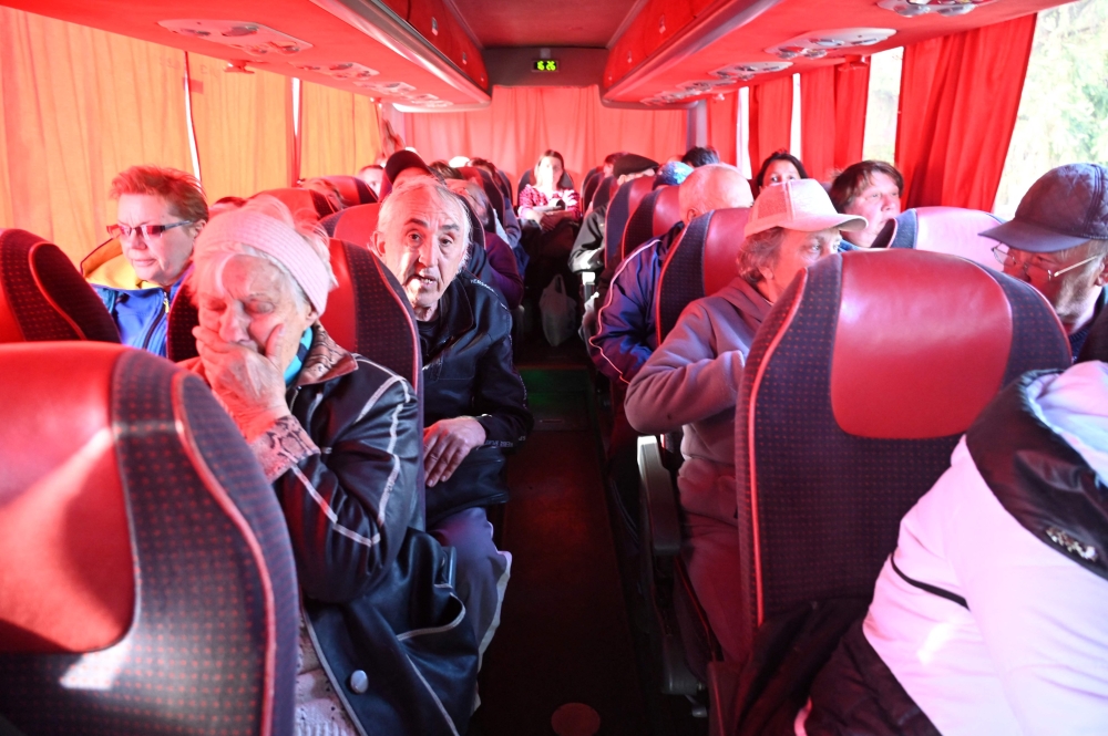 Residents of settlements in the north of the Kharkiv region are evacuated in a bus on May 10, 2024, amid the Russian invassion in Ukraine. — AFP pic