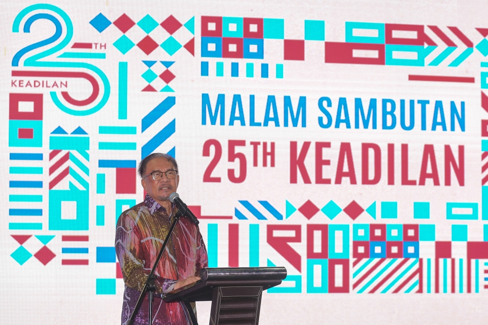 Prime Minister Datuk Seri Anwar Ibrahim speaking during the PKR's 25th Anniversary celebrations at Sentul Depot in Kuala Lumpur May 11, 2024. — Picture by Yusof Mat Isa