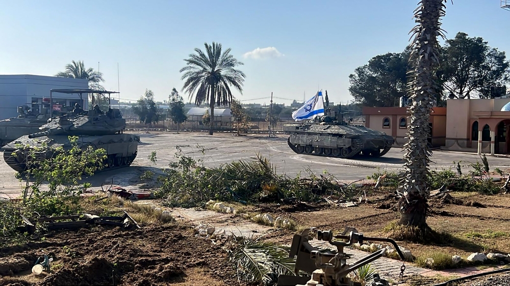This handout picture released by the Israeli army shows the 401st Brigade’s combat team tanks entering the Palestinian side of the Rafah border crossing on May 7, 2024. — AFP pic/Israeli Army handout