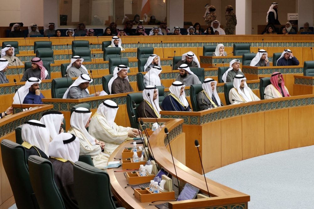 Kuwait’s emir approved a new cabinet yesterday two days after he dissolved the parliament elected only weeks earlier, and he and the new government assumed some of the assembly’s powers. — AFP pic