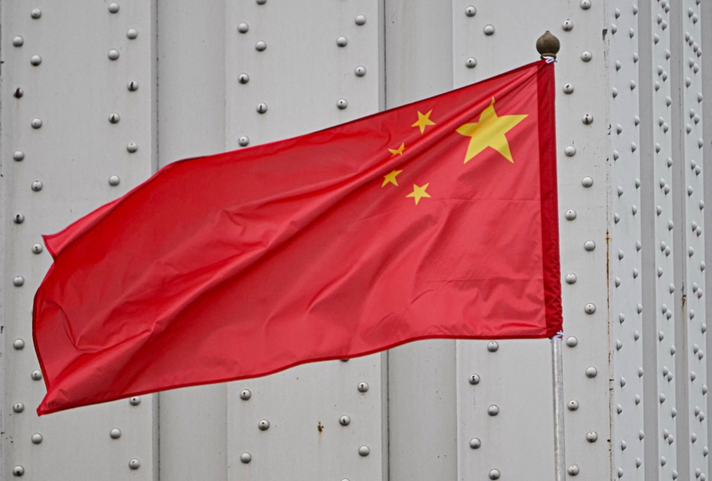 China does not tolerate political dissent and has used sophisticated tech tools and intimidation to crack down on domestic protesters and activists. — AFP pic