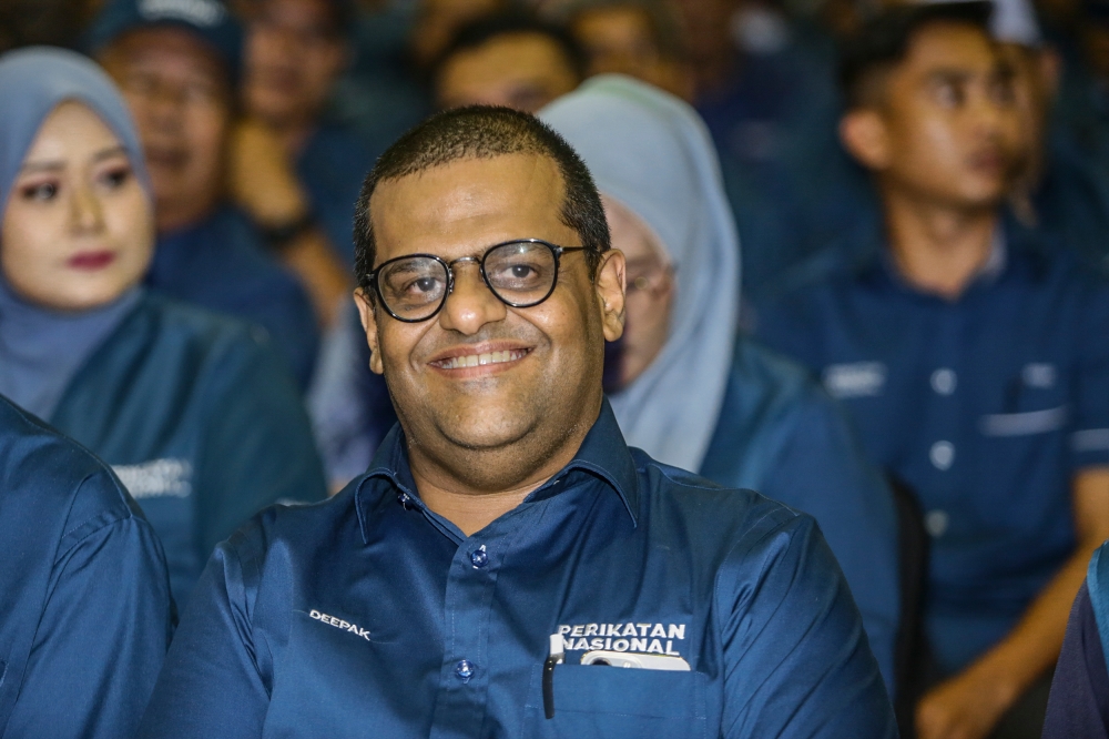 Deepak Jaikishan said the statements by Azmin Ali in his political talk on March 11 last year about him being friends with Datin Seri Rosmah Mansor, who is the wife of former Prime Minister Datuk Seri Najib Razak, and mentioning the word ‘telur’ (egg) repeatedly was personally defamatory to him. — Picture by Hari Anggara