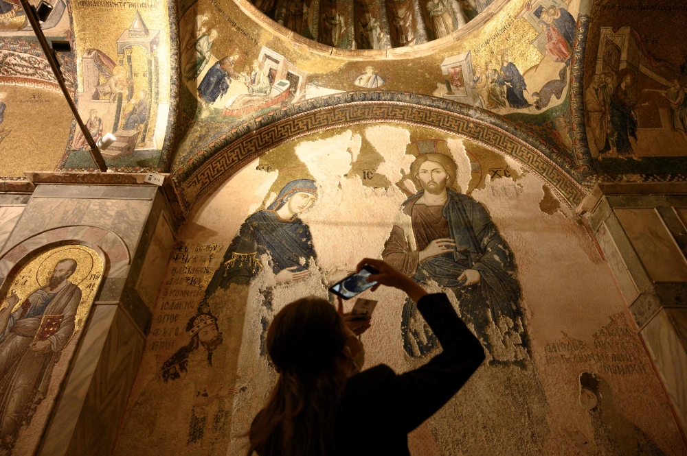 A tourist at the Chora or Kariye Museum, formally the Church of the Holy Saviour, a medieval Byzantine Greek Orthodox church, in August 21, 2020 in Istanbul. — AFP pic