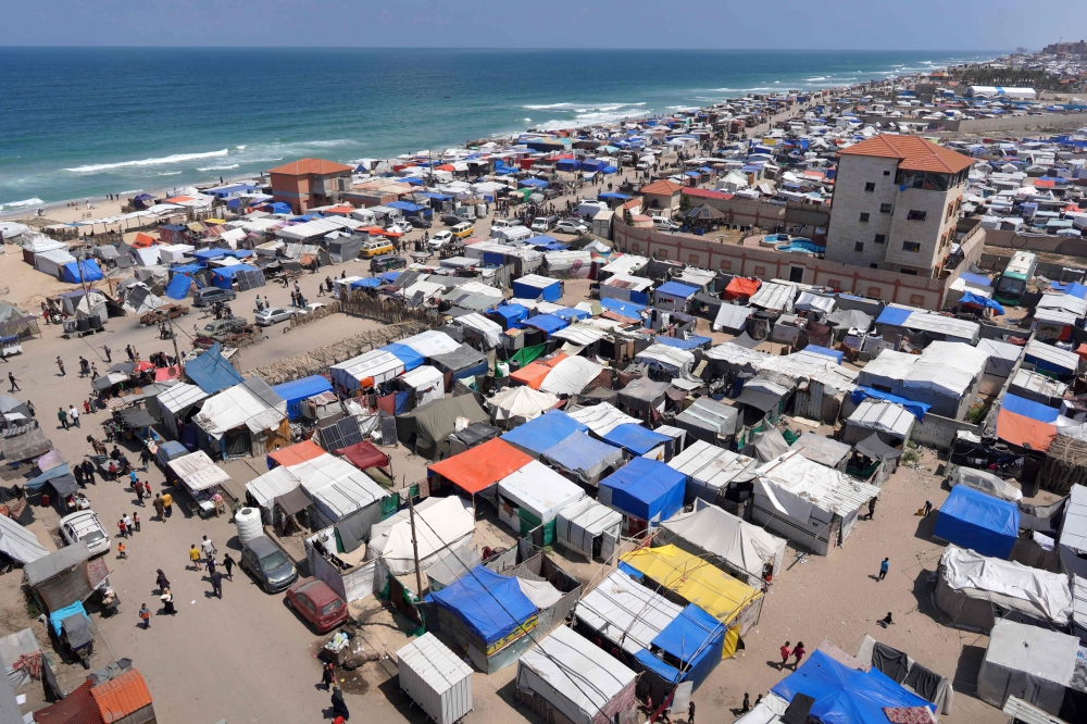 Tents set up along the beach in Deir el-Balah in the central Gaza Strip by Palestinians who fled Rafah. — AFP pic 