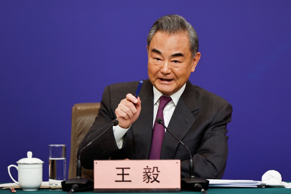 Chinese Foreign Minister Wang Yi called for better relations with South Korea as he met with his counterpart from Seoul during rare talks in Beijing, state-run Xinhua reported today. — Reuters pic
