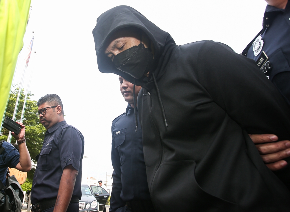 Senior police officer in Ipoh hit and run case pleads not guilty to student’s murder