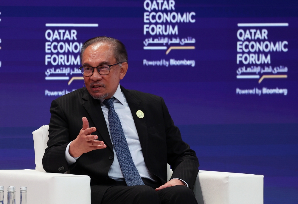 Prime Minister Datuk Seri Anwar Ibrahim speaks at the plenary session in conjunction with the Qatar Economic Forum (QEF) 2024, May 14, 2024. — Bernama pic 