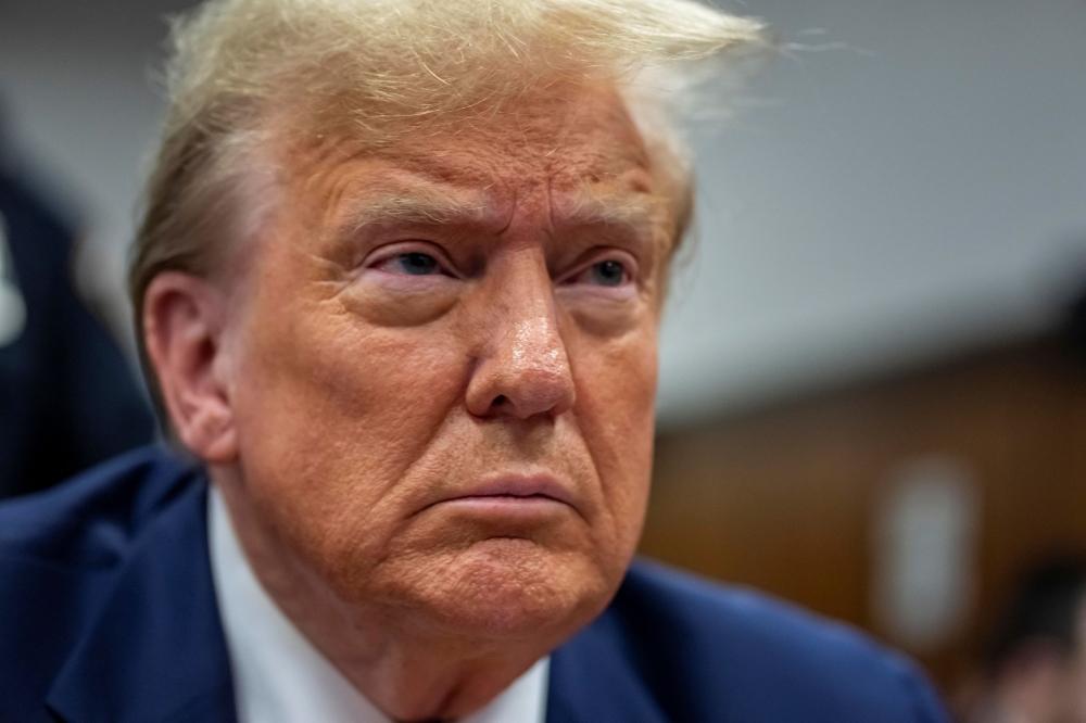 Former US President Donald Trump said US tariffs on China needed to be further expanded. — Reuters pic