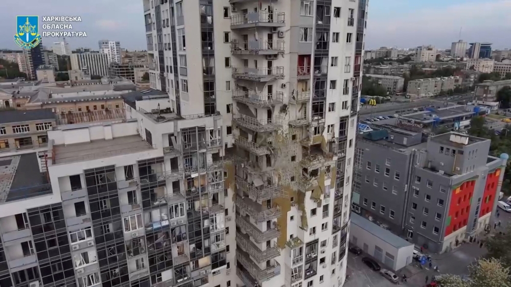A view of a damaged residential building in the aftermath of a Russian strike, amid Russia's attack on Ukraine, in Kharkiv, Ukraine, May 14, 2024 in this still image taken from video.   — Kharkiv Regional Prosecutor's Office handout via Reuters
