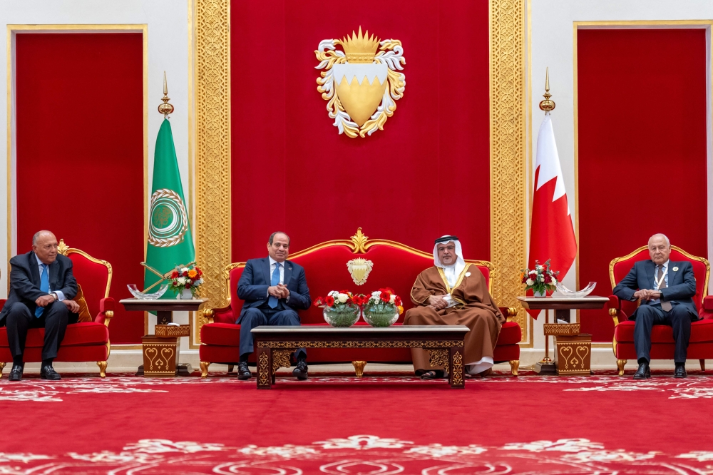 This handout picture from the official Bahrain News Agency (BNA) shows Bahrain’s King Hamad bin Isa al-Khalifa (centre, right) receiving Egypt’s President Abdel Fattah al-Sisi (centre, left), along with his Foreign Minister Sameh Shoukry (left) and Arab League Secretary-General Ahmed Aboul-Gheit (right) in Manama on May 15, 2024 ahead of the 33rd Arab League Summit. — AFP pic/BNA