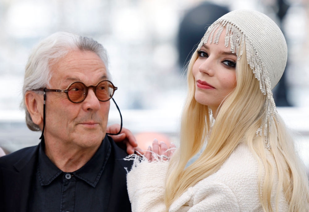 Director George Miller and cast member Anya Taylor-Joy pose during a photocall for the film 