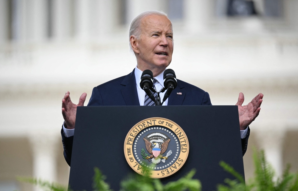 US President Joe Biden speaks at the National Peace Officers's Memorial Service outside the US Capitol in Washington, DC, May 15, 2024. — AFP pic