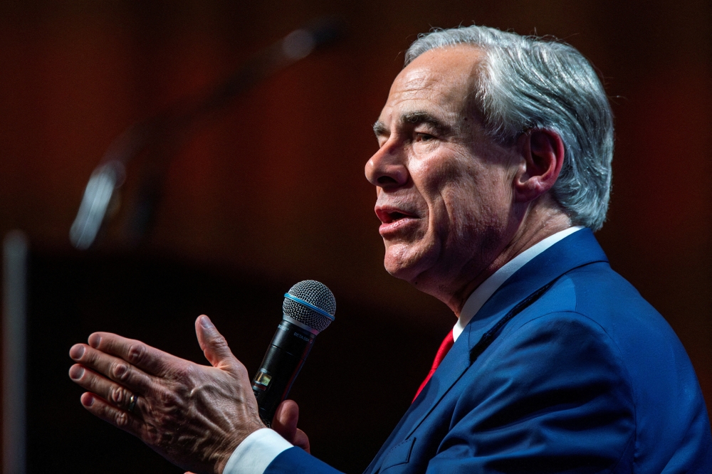 Texas’ Republican governor Greg Abbott pardoned a US Army sergeant on Thursday who was convicted of murder for shooting a protester during a Black Lives Matter rally in 2020. — Reuters pic