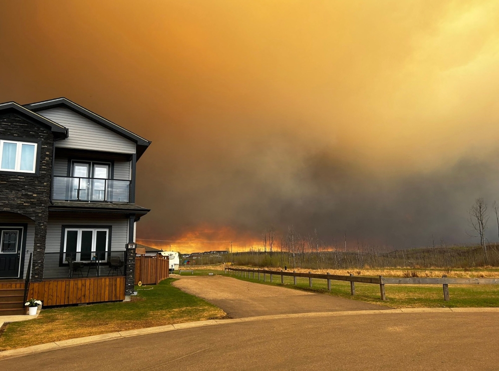 Thousands of residents of Fort McMurray, a city in Canada’s major oil-producing region, fled as an out-of-control wildfire drew near and thick smoke filled the skies. — AFP pic/KOSAR handout
