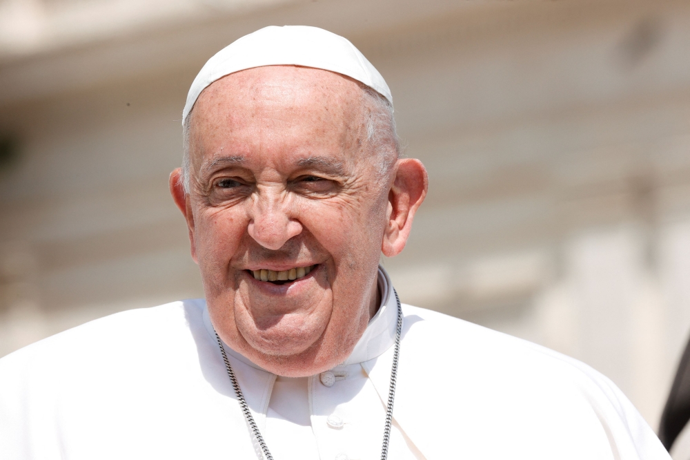 Pope Francis reacts on the day of the weekly general audience in Saint Peter Square at the Vatican, May 15, 2024. — Reuters pic