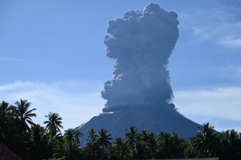 This handout photo taken and released by the Center for Volcanology and Geological Hazard Mitigation (PVMBG) on May 13, 2024 shows Mount Ibu spewing thick smoke in Indonesia's North Maluku Province. — AFP pic/Centre for Volcanology and Geological Hazard Mitigation (PVMBG)