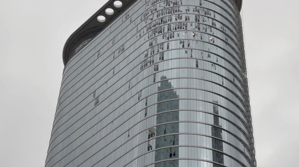 A view of damaged windows of a building following a storm in Houston, Texas May 16, 2024 in this screengrab obtained from a social media video. — Go Coogs via X@vic4uh via Reuters pic