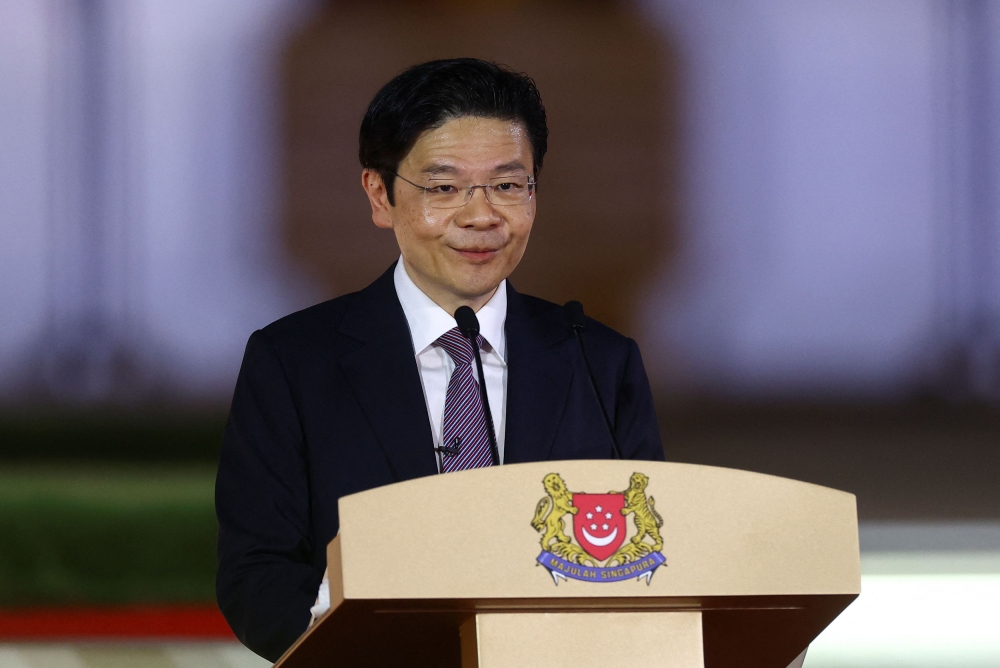 Singapore's new Prime Minister Lawrence Wong speaks on the day he is sworn in as Singapore's fourth Prime Minister at the Istana, in Singapore May 15, 2024. — Reuters pic