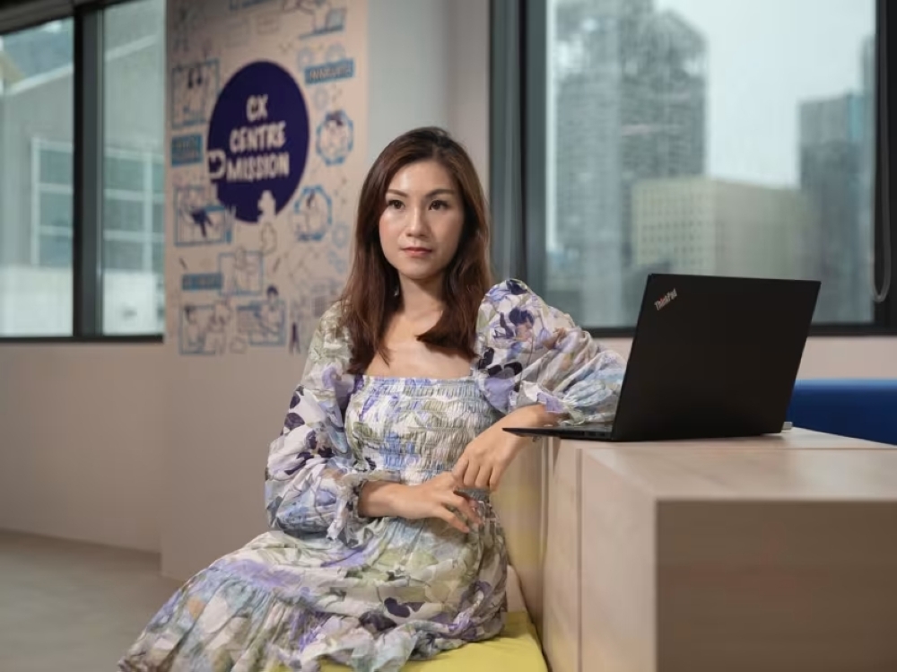 Ms Samantha Ong’s approach towards work is to work harder while she is young, so she would be able to retire earlier. — TODAY pic