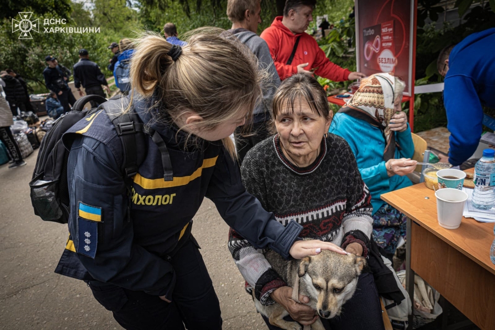 This handout photograph taken and released by Ukrainian Emergency Service on May 17, 2024, shows rescuers evacuating civilians from Russian shelling in Kharkiv region. — AFP pic