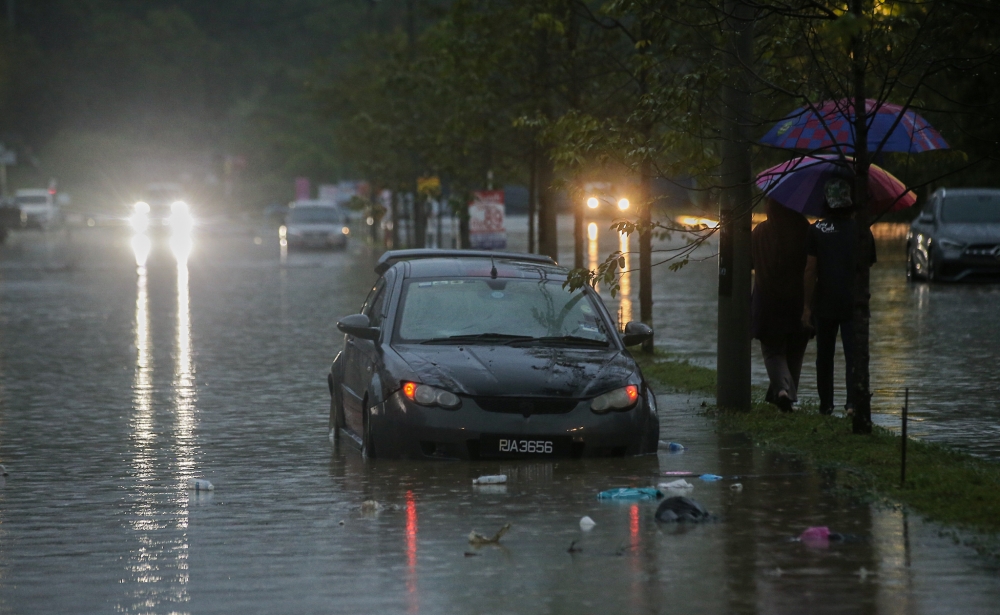 File picture of a flash flood in Perak, November 13, 2023. — Picture by Farhan Najib