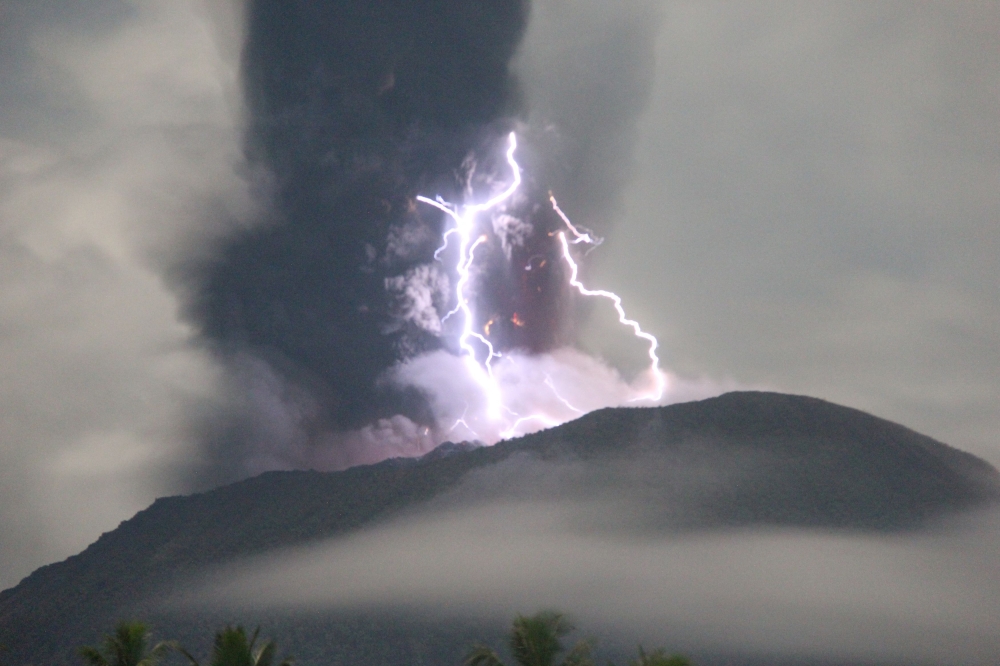 Mount Ibu erupted on Saturday evening, sending ash 4km high, as streaks of purple lightning flashed around its crater, according to information and images shared by Indonesia’s volcanology agency. Reuters pic/Centre for Volcanology and Geological Hazard Mitigation (PVMBG) handout