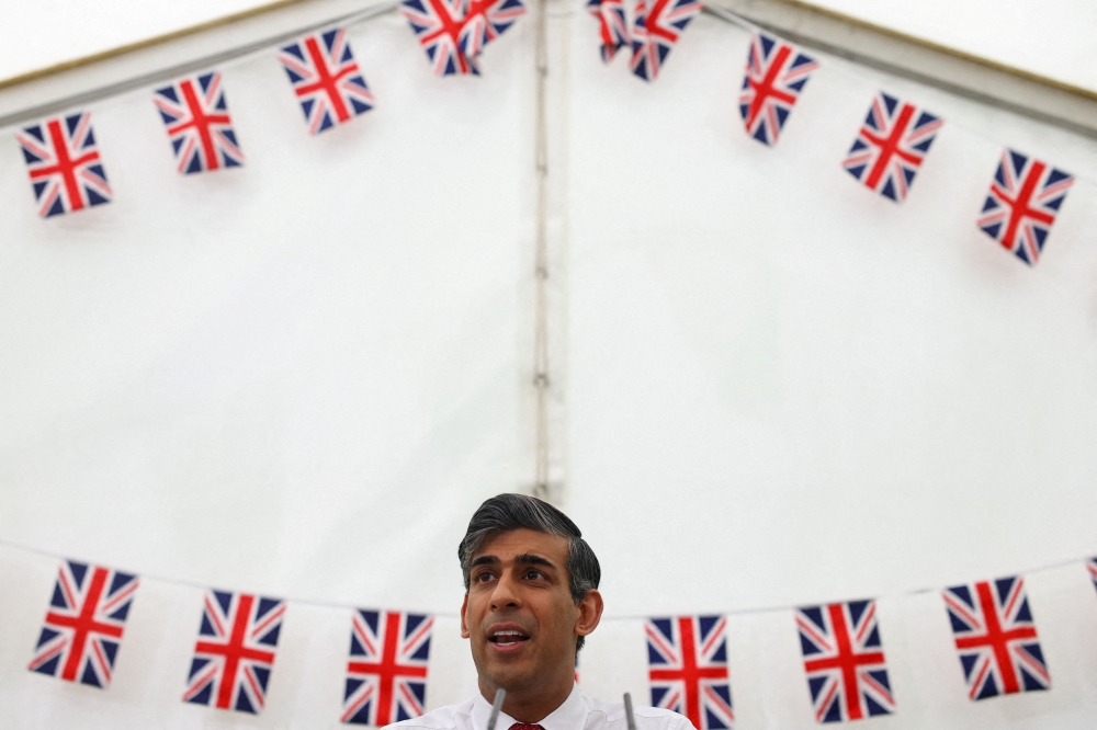 Ahead of the publication of an independent inquiry report tomorrow, the Sunday Times said Prime Minister Rishi Sunak would make an official apology. — Reuters pic