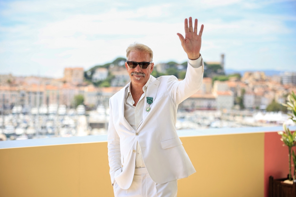 US director Kevin Costner poses after being awarded Chevalier de l’Ordre des Arts et des Lettres, on the sidelines of the 77th edition of the Cannes Film Festival in Cannes, southern France, on May 19, 2024. — AFP pic