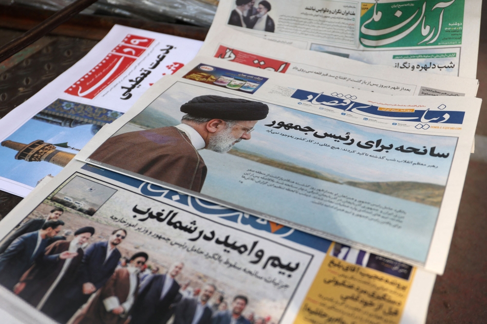 A newspaper with a picture of the late Iran's President Ebrahim Raisi is seen in Tehran, Iran May 20, 2024. — Majid Asgaripour/WANA (West Asia News Agency) via Reuters