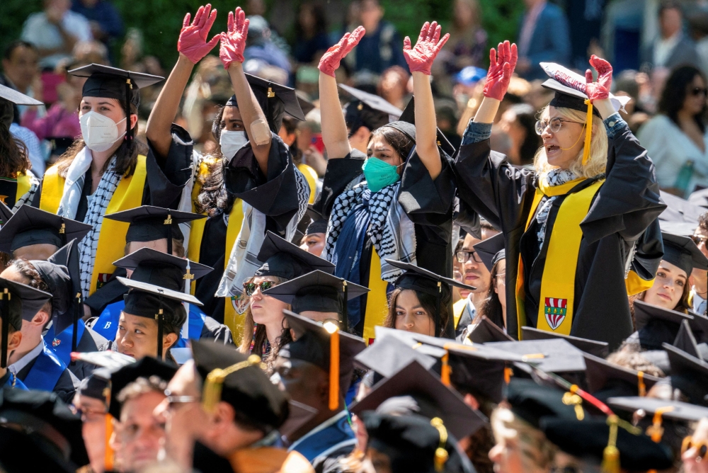 Graduates protest the conflict between Israel and the Palestinian Islamist group Hamas, during the commencement at Yale University, New Haven, Connecticut May 20, 2024. — Reuters pic